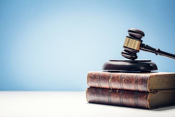 Judge gavel and law books in court, law and justice background concept with copy space